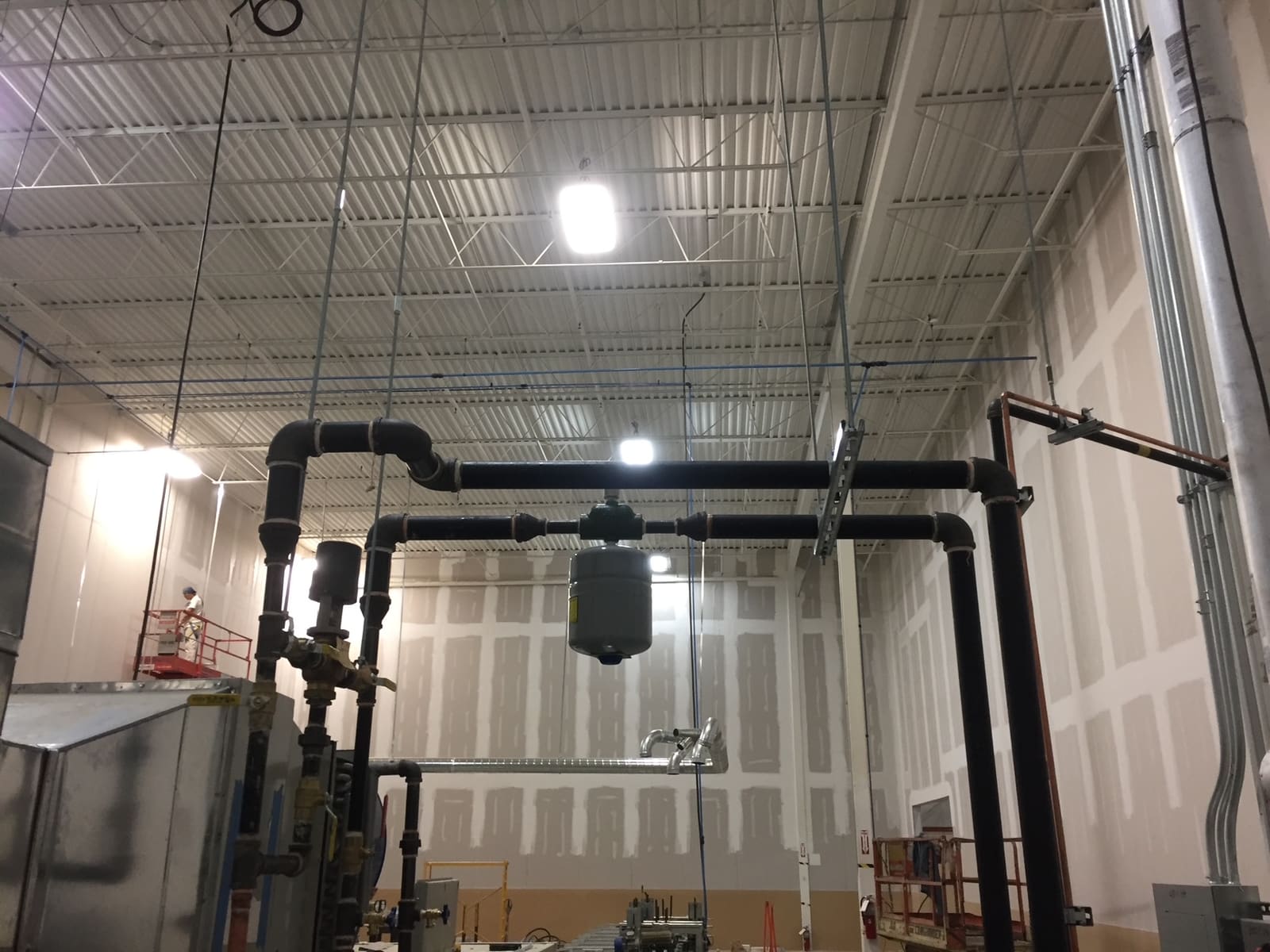 Overhead black steel piping with expansion tank — Commercial & Industrial project by Glen The Plumber